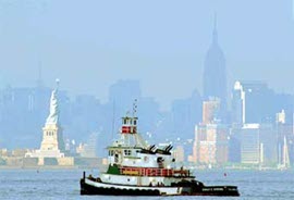 Tug near the Statue of Liberty